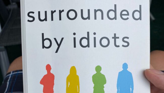 surrounded_by_idios_cover